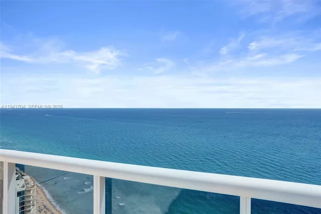 a view of an ocean from a balcony
