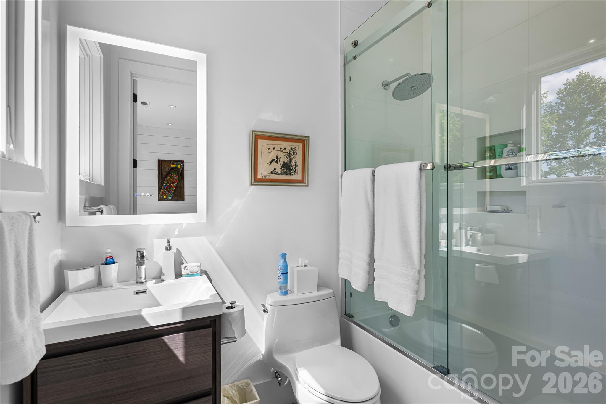 2235 Cold Mountain Road Lake Toxaway, NC 28747 - Photo 30 of 47 a bathroom with a sink toilet and shower