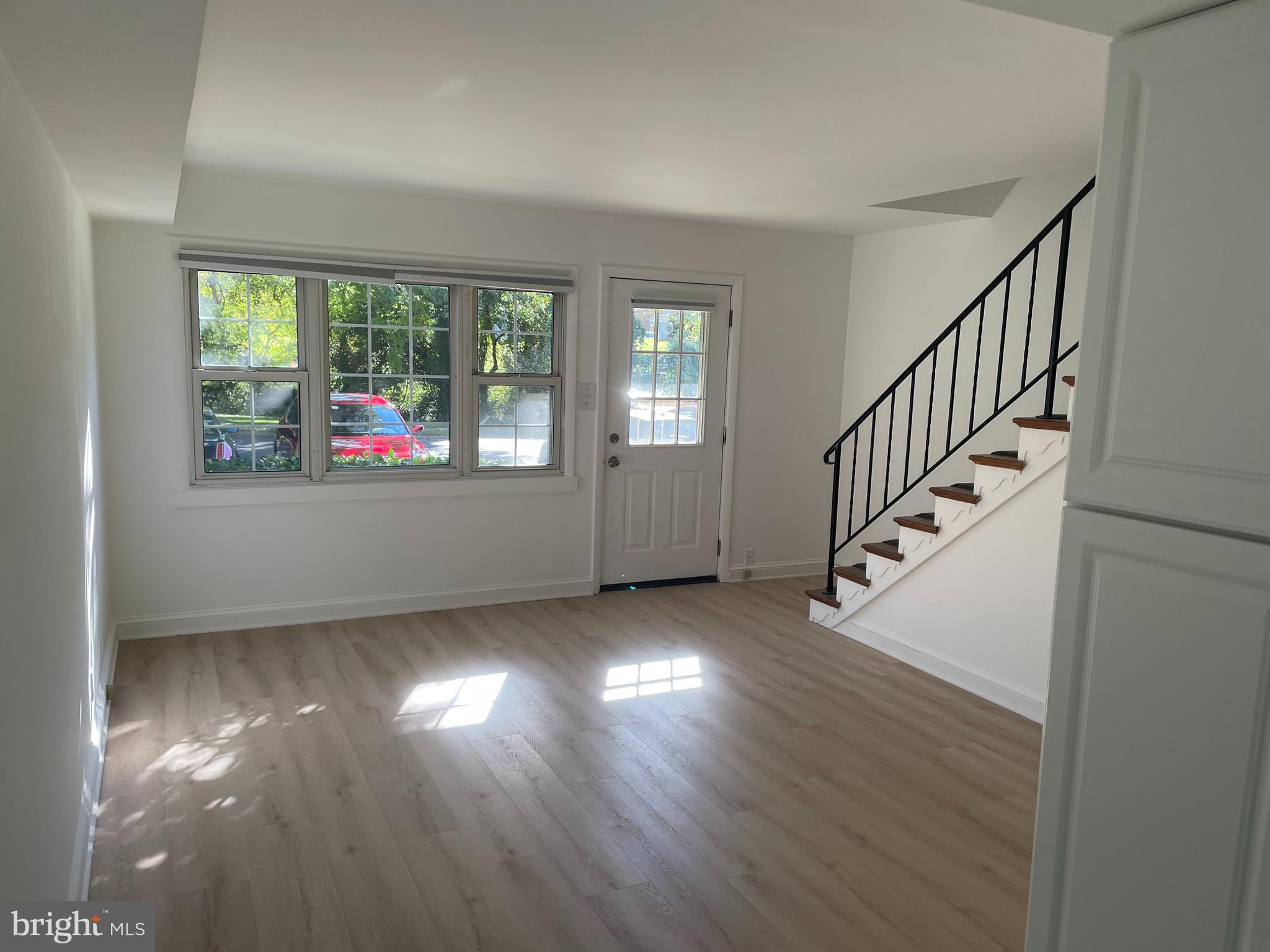 26 South Monroe Road, Unit 26 Annapolis, MD 21402 - Photo 2 of 13 a view of an entryway with wooden floor