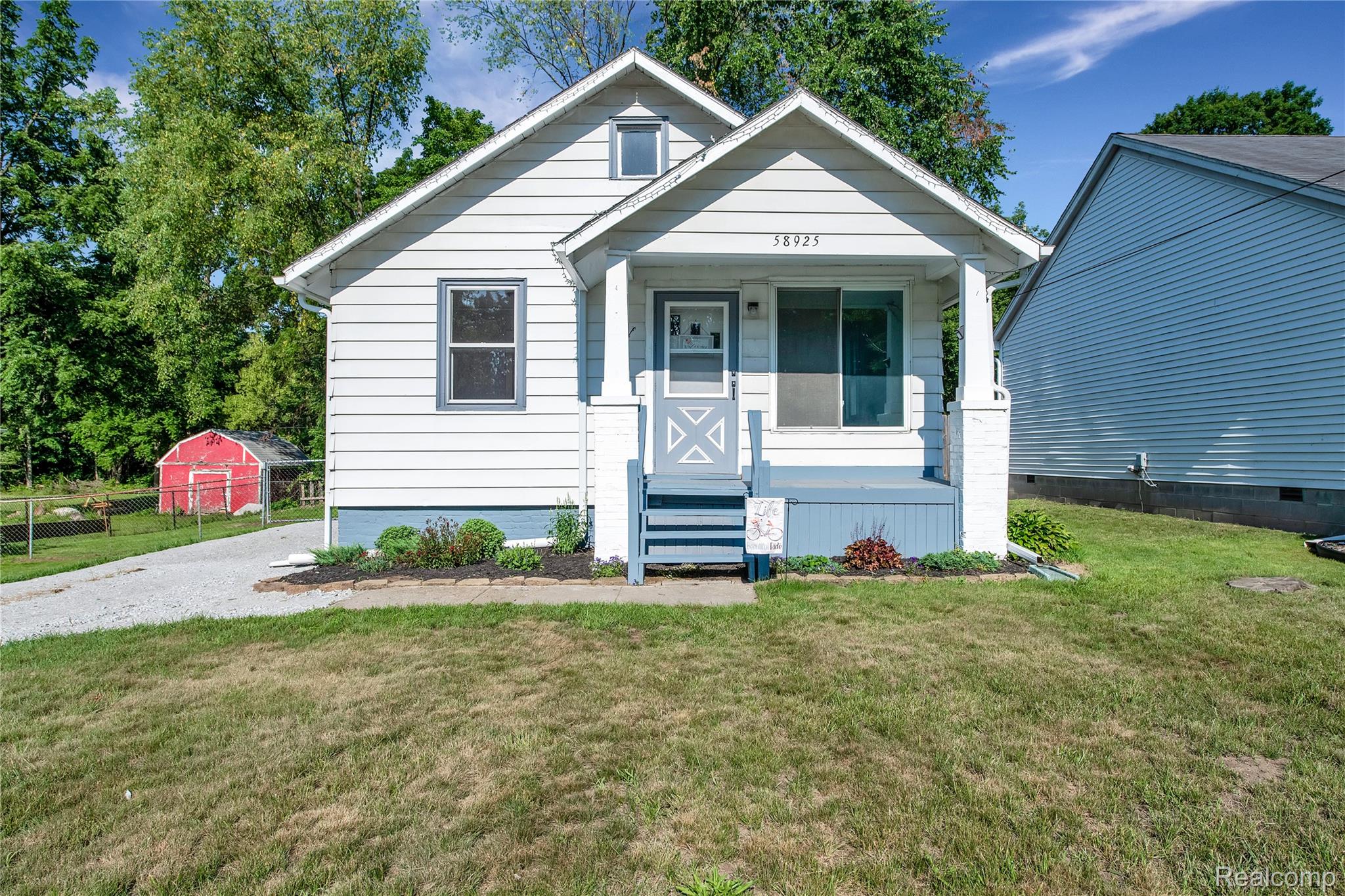 58925 Haven Ridge Road New Haven, MI 48048 - Photo 2 of 22 Bungalow with a porch