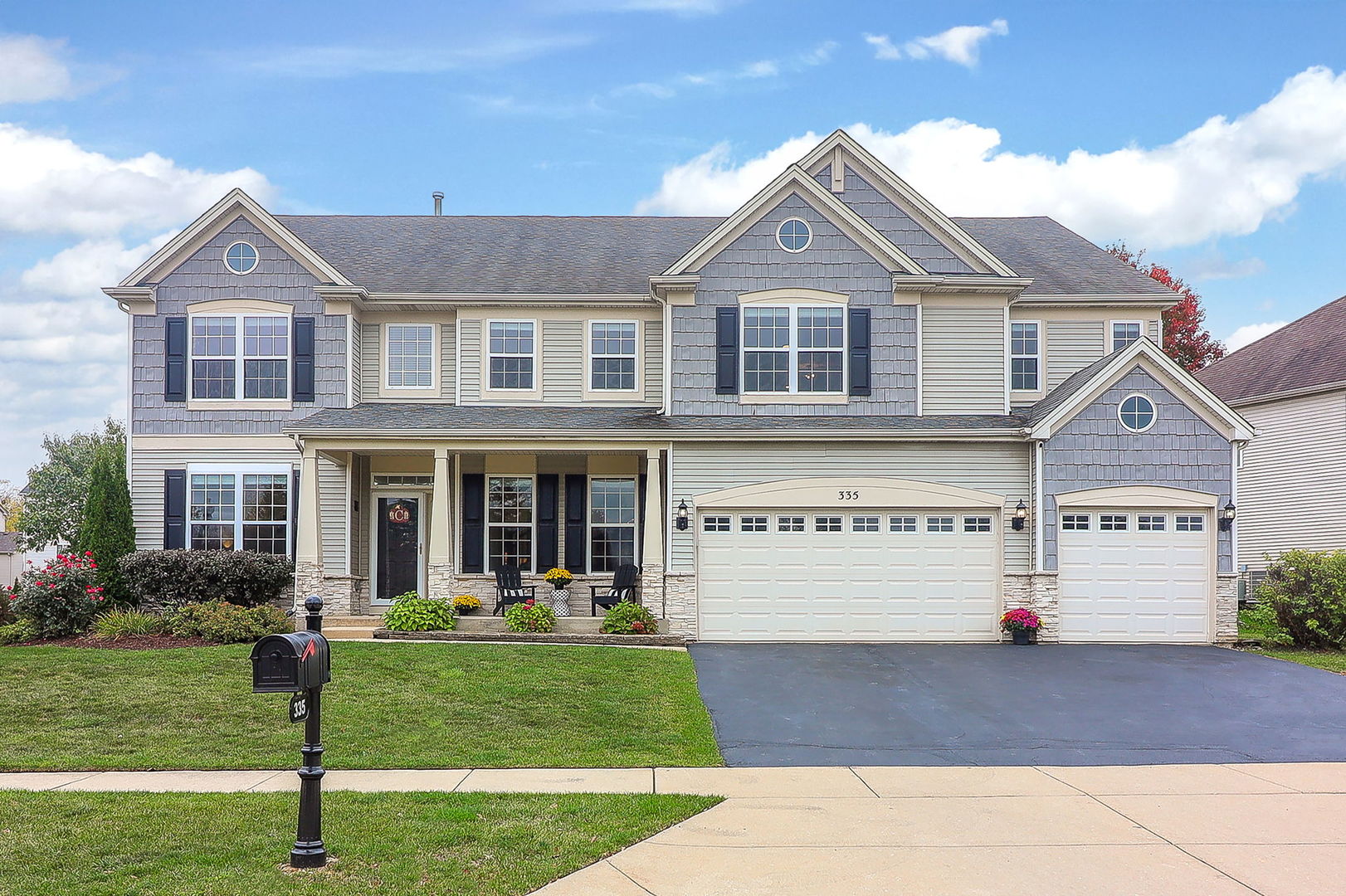 335 Forest Trail South Elgin, IL 60177 - Photo 1 of 47 a front view of a house with a yard