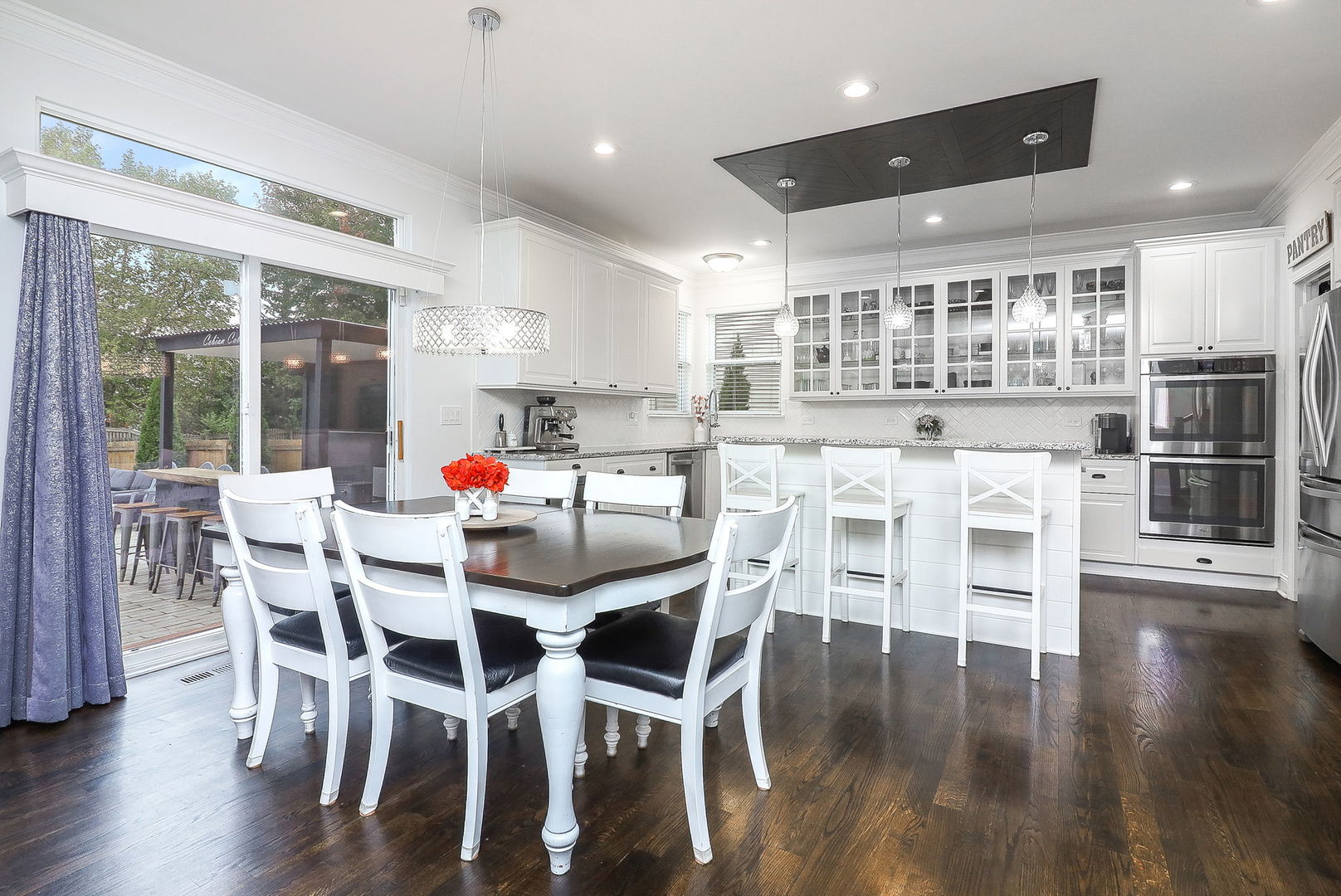 335 Forest Trail South Elgin, IL 60177 - Photo 12 of 47 a view of a dining room with furniture window and wooden floor
