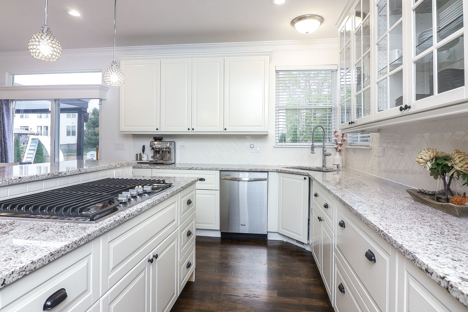335 Forest Trail South Elgin, IL 60177 - Photo 13 of 47 a kitchen with granite countertop a sink stove and cabinets