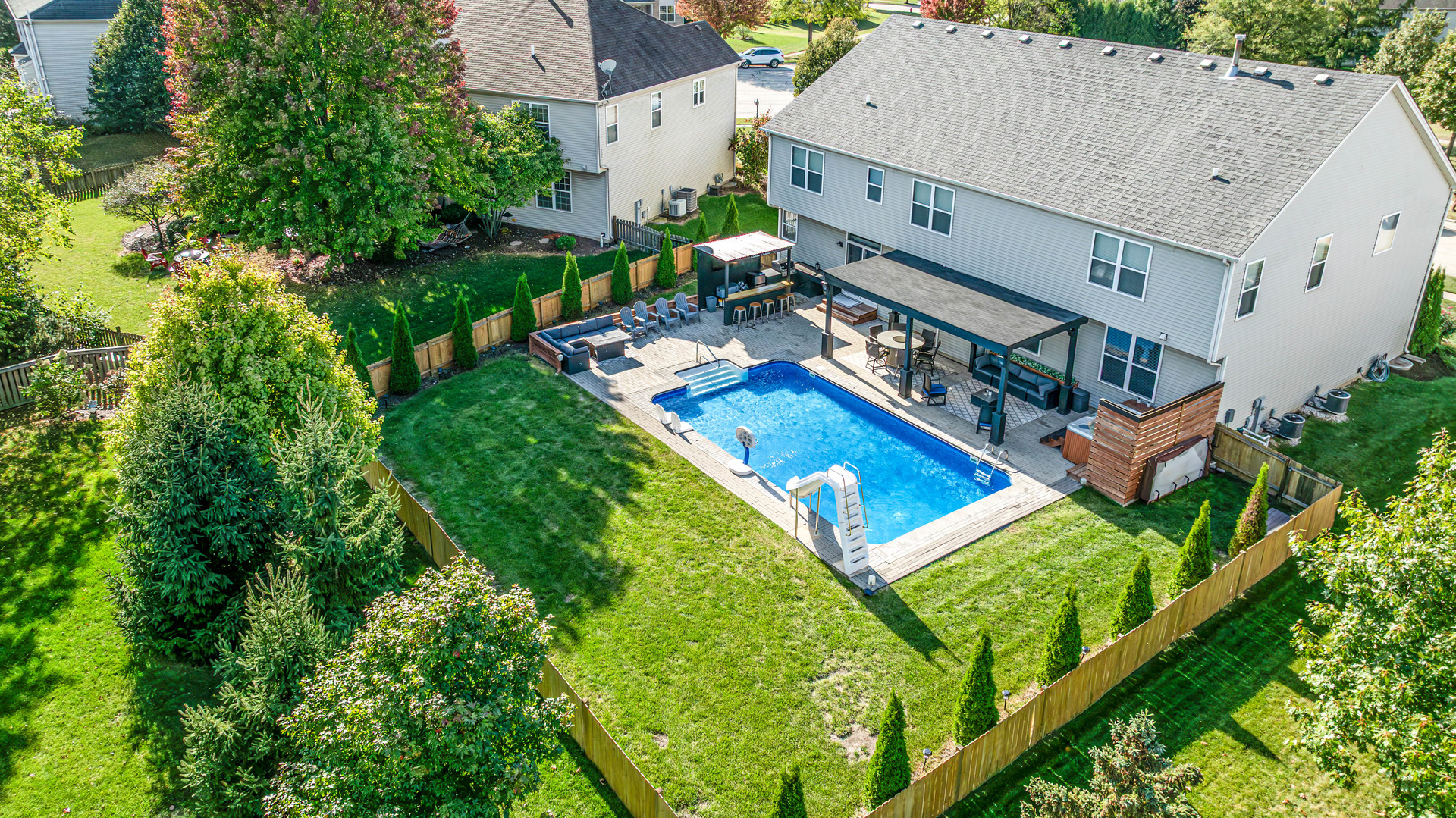335 Forest Trail South Elgin, IL 60177 - Photo 2 of 47 an aerial view of a house with pool and a yard