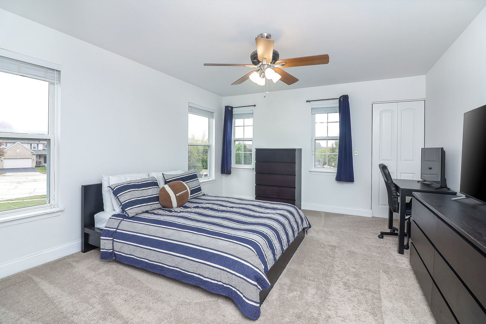 335 Forest Trail South Elgin, IL 60177 - Photo 31 of 47 a bedroom with a bed and a chandelier