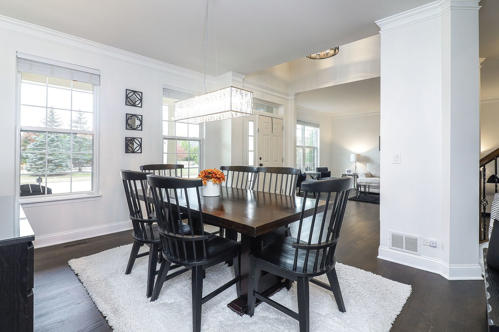 335 Forest Trail South Elgin, IL 60177 - Photo 10 of 47 a view of a dining room with furniture and wooden floor