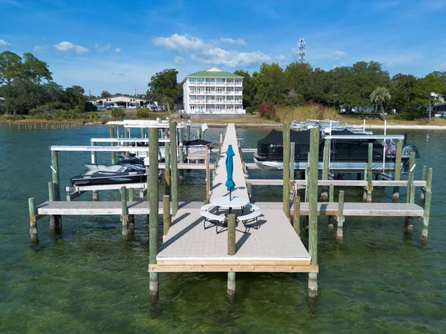 a view of a lake with outdoor seating