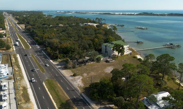 a view of a lake with sitting area