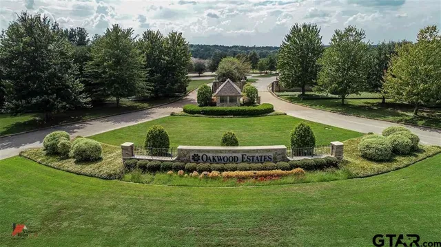 an aerial view of a house with a garden