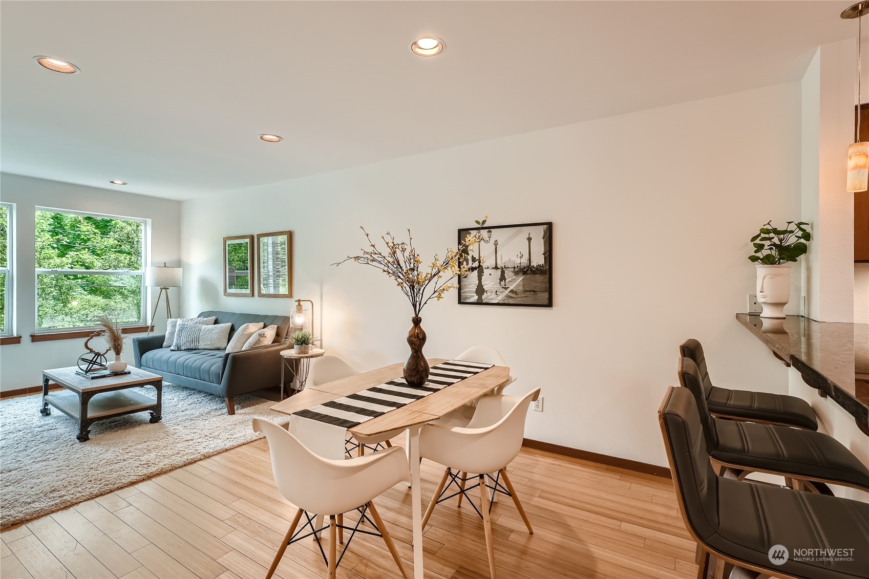 4313 South Webster Street, Unit B Seattle, WA 98118 - Photo 13 of 26 a work room with furniture and a window