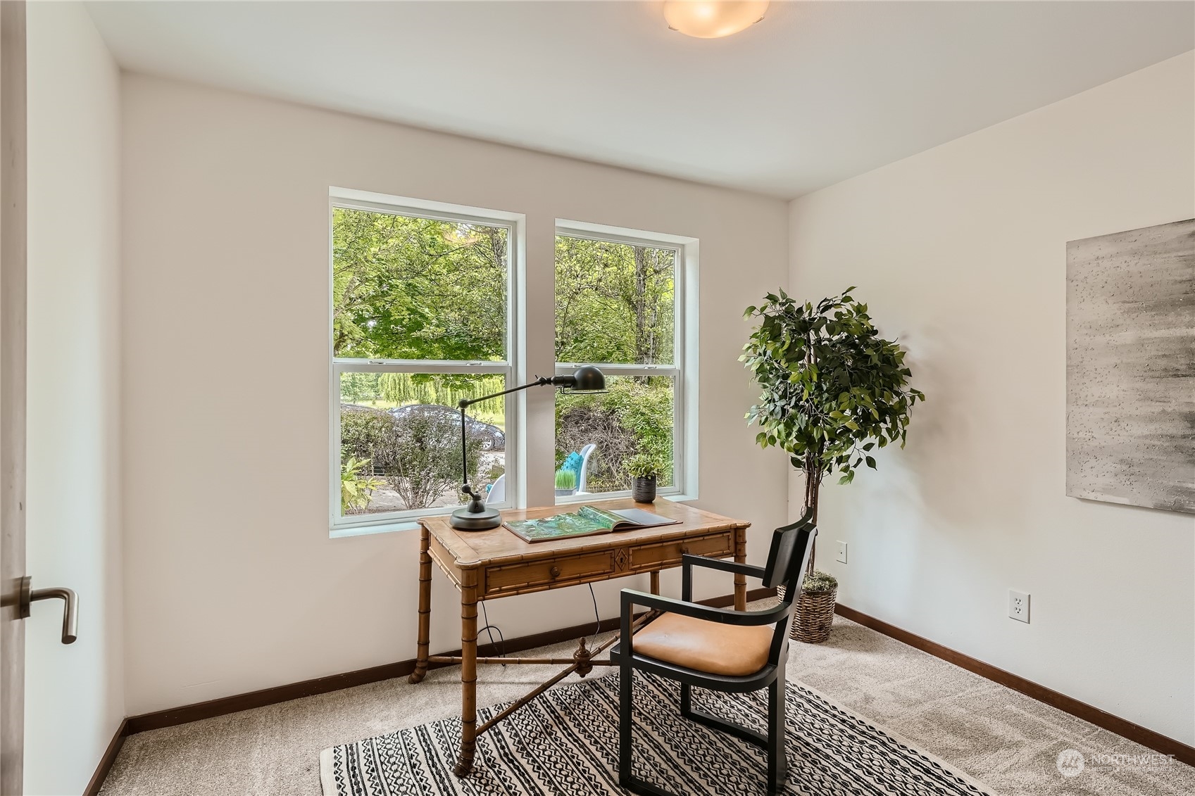 4313 South Webster Street, Unit B Seattle, WA 98118 - Photo 24 of 26 a dining room with furniture and window