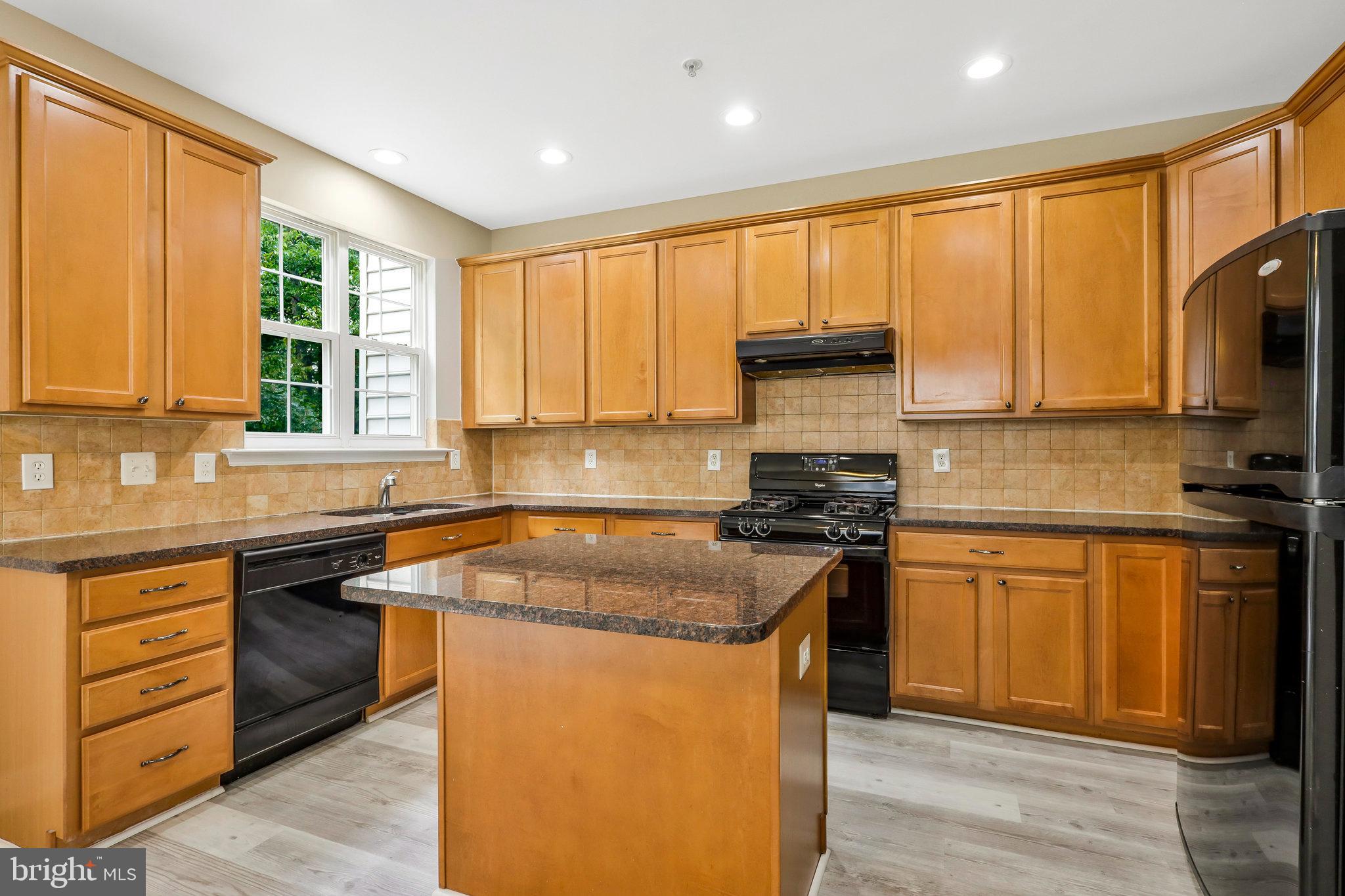 8114 Mississippi Road Laurel, MD 20724 - Photo 13 of 41 Open kitchen with island