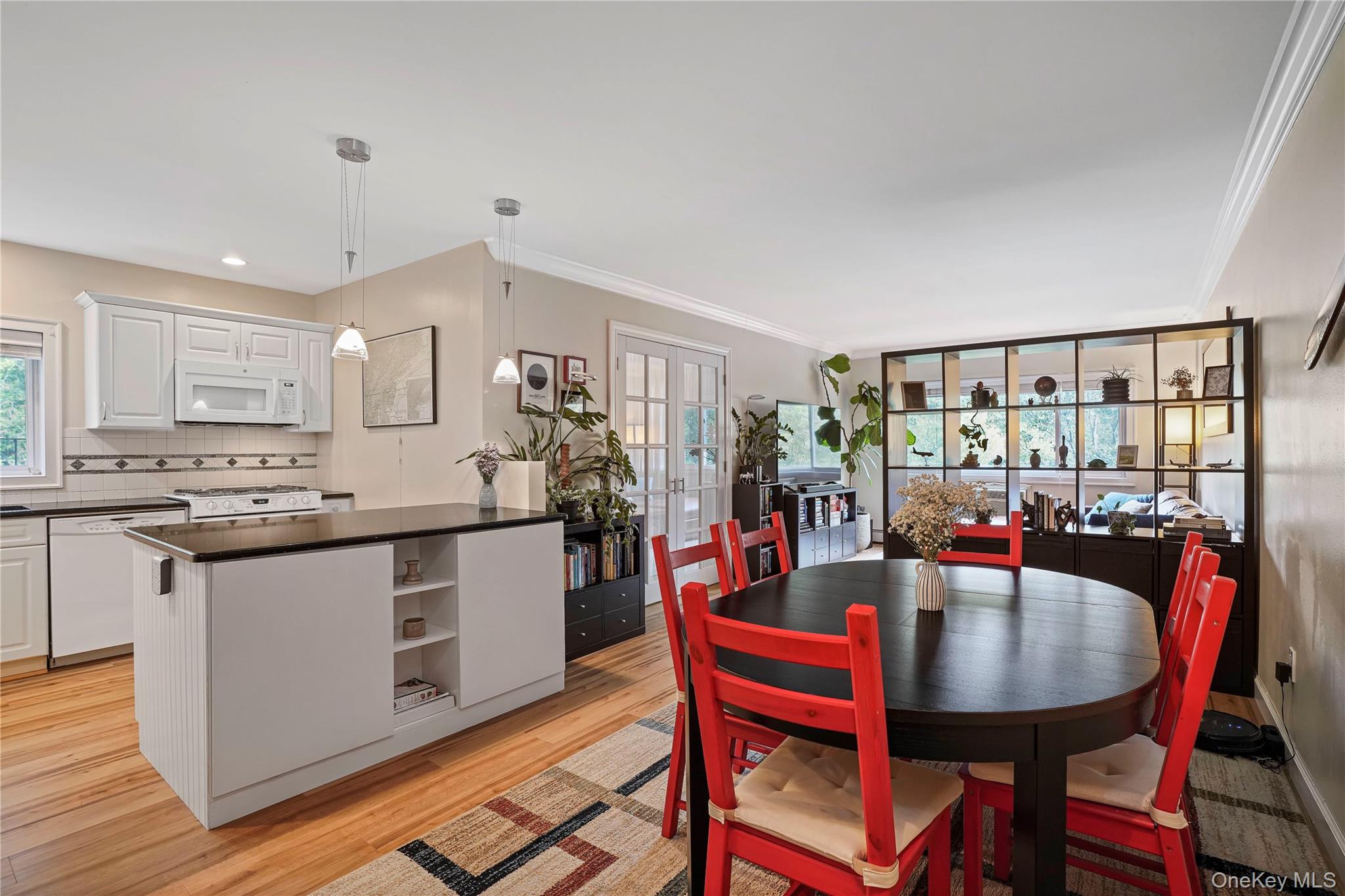 Open Layout Living Space (Dining Area, Kitchen, Living Room) and access to Home Office and Balcony