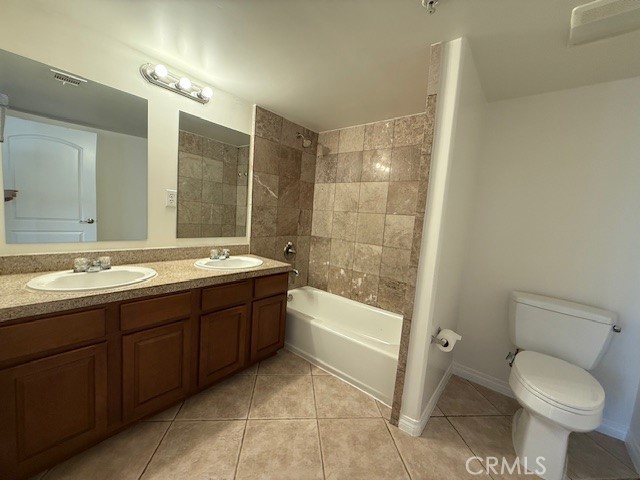 13525 Vanowen Street, Unit 102 Van Nuys, CA 91405 - Photo 11 of 13 a bathroom with a sink toilet and shower