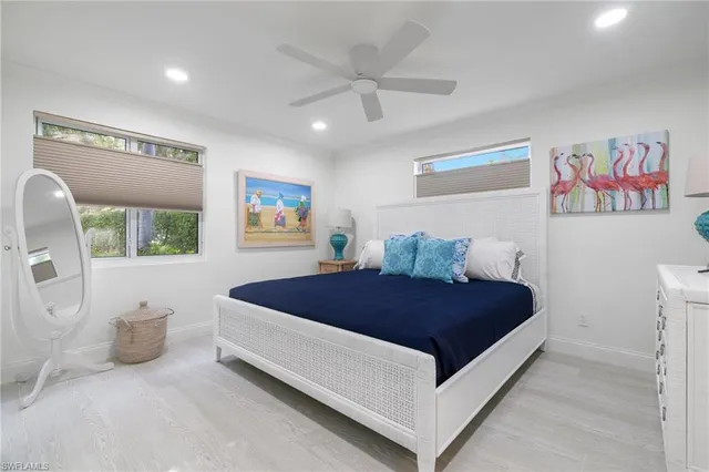 a bed room with a bed and a couch