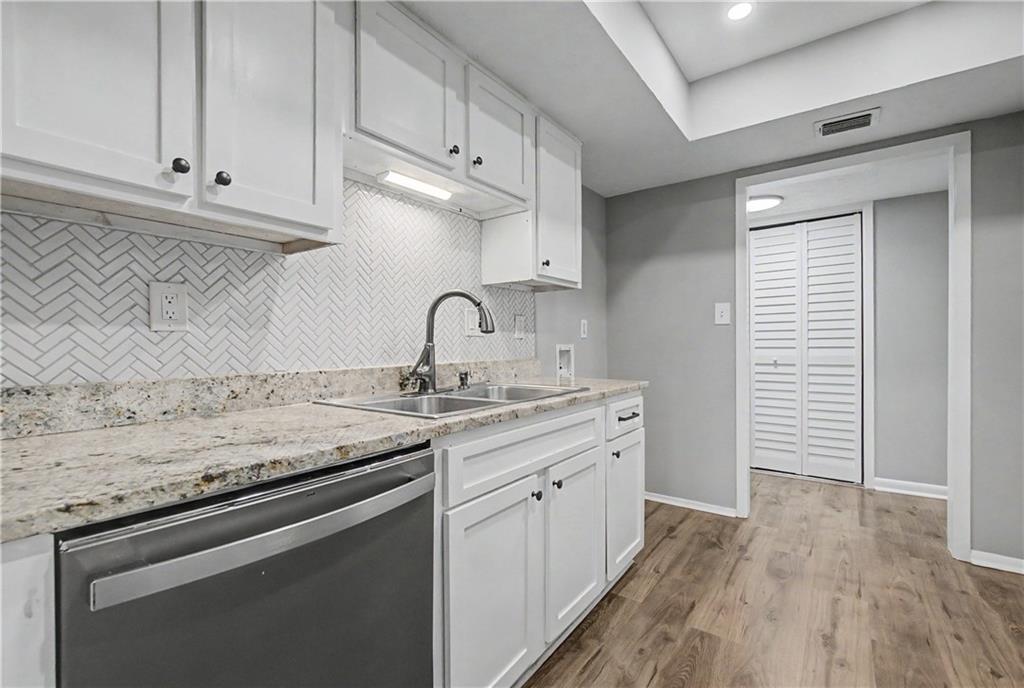2011 Canyon Point Circle Roswell, GA 30076 - Photo 12 of 22 a kitchen with a sink cabinets and appliances