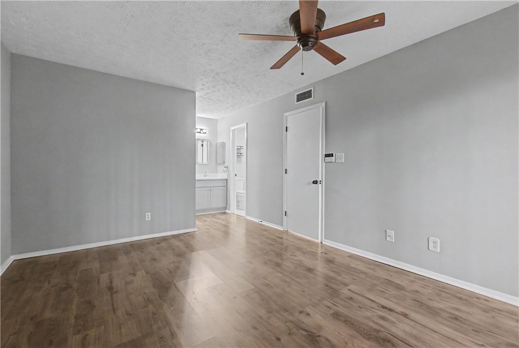 2011 Canyon Point Circle Roswell, GA 30076 - Photo 18 of 22 wooden floor in an empty room