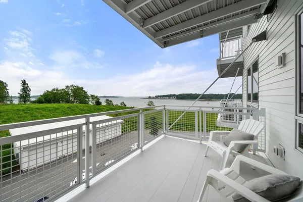 a view of a swimming pool with a lounge chairs