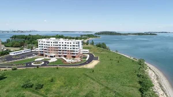 a view of a lake with a big yard