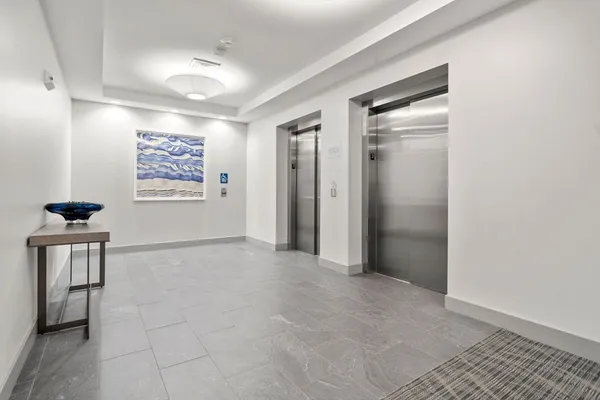 a view of a hallway with workspace