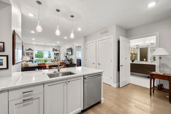 a kitchen with counter space cabinets and appliances