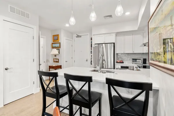 a view of a dining room with furniture