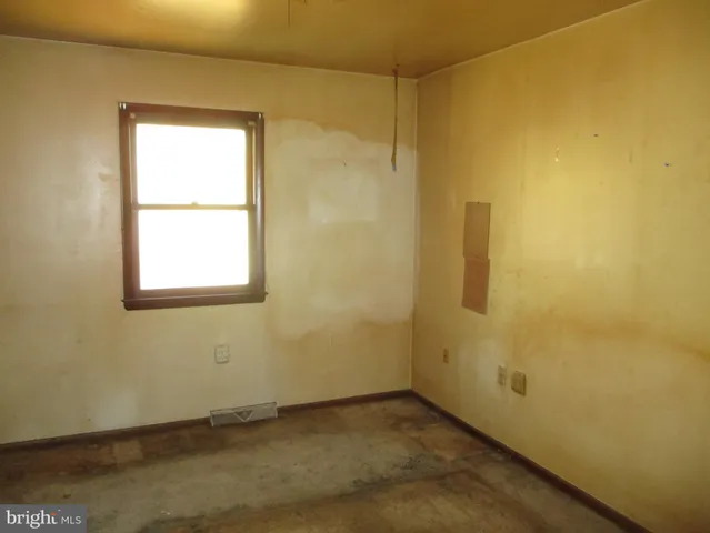 a view of a small space with a window