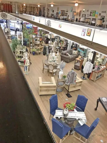 a view of swimming pool with outdoor seating