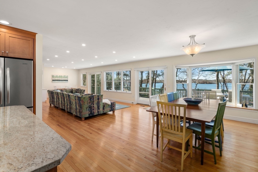 130 Pimlico Pond Road Mashpee, MA 02649 - Photo 11 of 39 a view of a dining room with furniture window and wooden floor