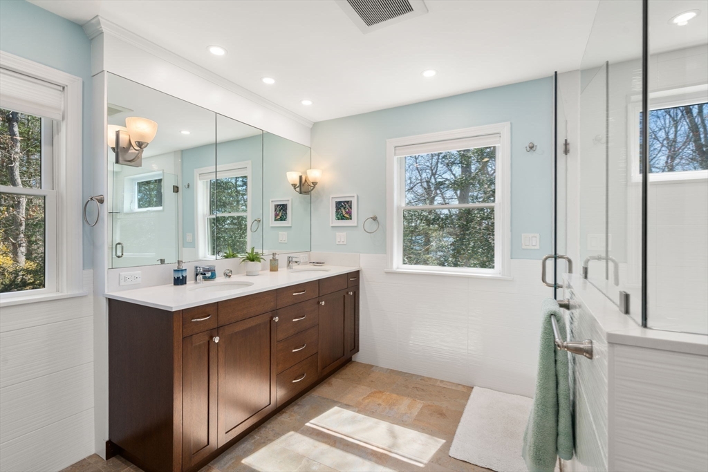 130 Pimlico Pond Road Mashpee, MA 02649 - Photo 17 of 39 a bathroom with a sink mirror and a bathtub