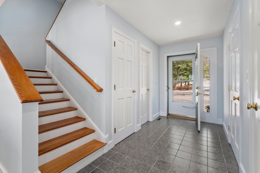 130 Pimlico Pond Road Mashpee, MA 02649 - Photo 19 of 39 a view of a hallway with a livingroom and a bathroom