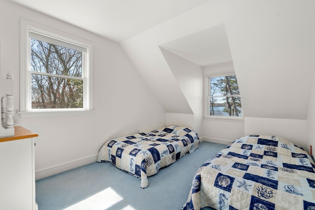 130 Pimlico Pond Road Mashpee, MA 02649 - Photo 23 of 39 a bedroom with two bed and a window