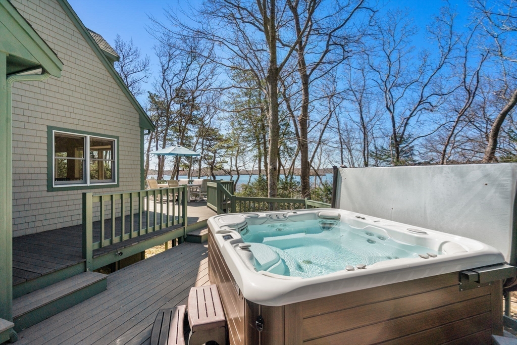 130 Pimlico Pond Road Mashpee, MA 02649 - Photo 26 of 39 a view of a backyard with sitting area