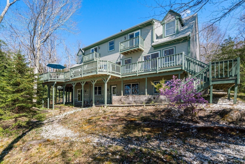 130 Pimlico Pond Road Mashpee, MA 02649 - Photo 28 of 39 a front view of a building with garden