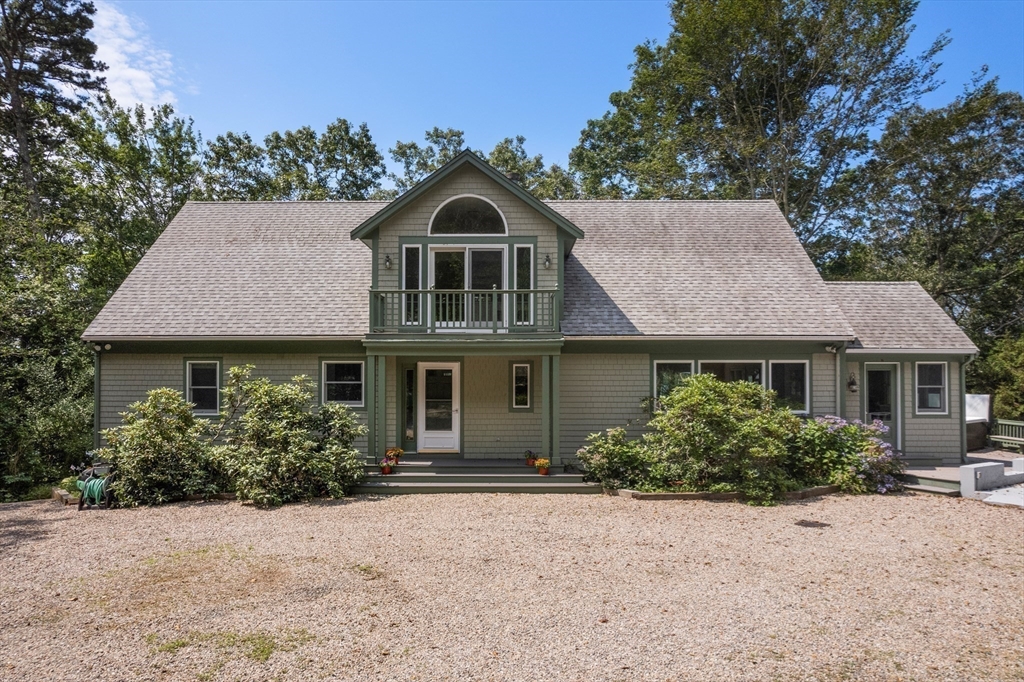 130 Pimlico Pond Road Mashpee, MA 02649 - Photo 32 of 39 front view of a house with a yard