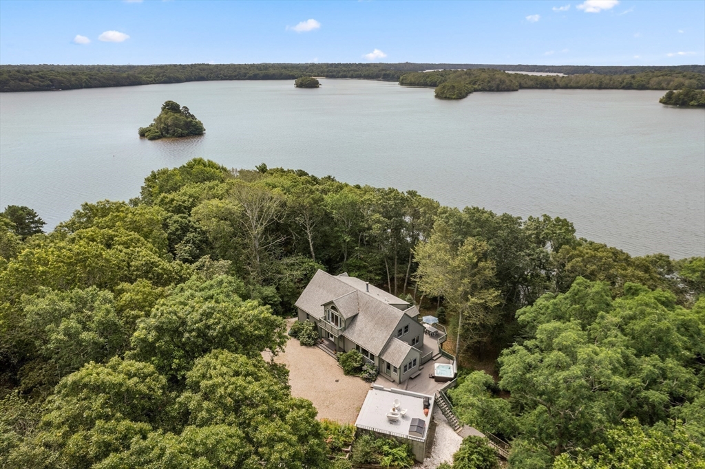 130 Pimlico Pond Road Mashpee, MA 02649 - Photo 33 of 39 an aerial view of a house with a lake view