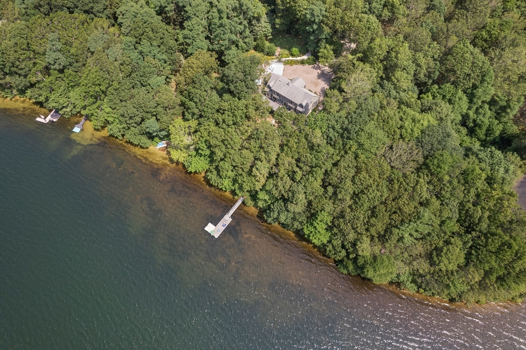 130 Pimlico Pond Road Mashpee, MA 02649 - Photo 35 of 39 a view of a house with a yard