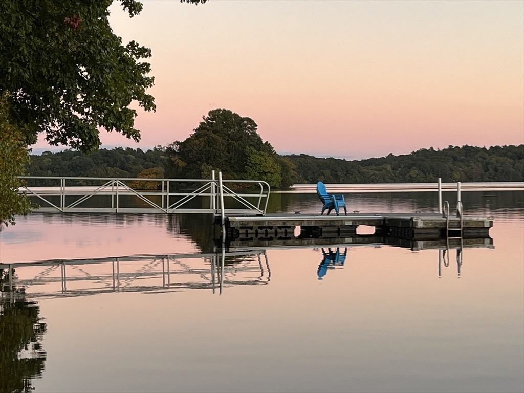 130 Pimlico Pond Road Mashpee, MA 02649 - Photo 4 of 39 a view of roof deck with lake and mountain view