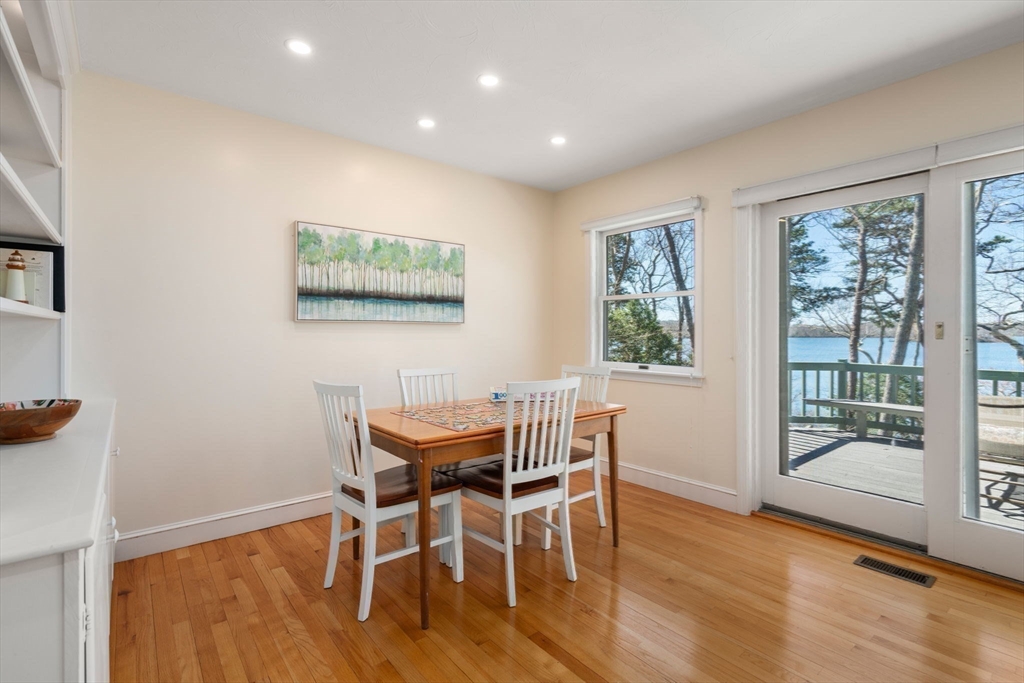 130 Pimlico Pond Road Mashpee, MA 02649 - Photo 9 of 39 a view of a dining room with furniture and wooden floor