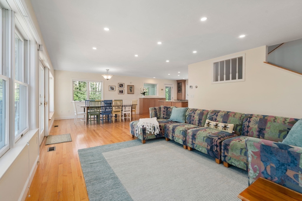 130 Pimlico Pond Road Mashpee, MA 02649 - Photo 10 of 39 a living room with furniture and wooden floor