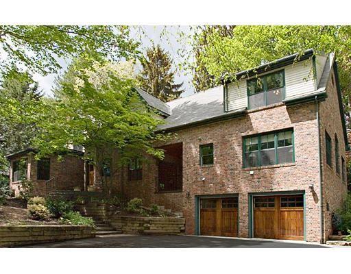 32 Chestnut Street Wellesley, MA 02481 - Photo 1 of 18 a front view of a house with garden
