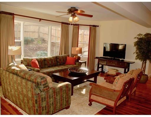 32 Chestnut Street Wellesley, MA 02481 - Photo 11 of 18 a living room with furniture and a flat screen tv