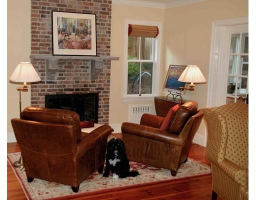 32 Chestnut Street Wellesley, MA 02481 - Photo 12 of 18 a living room with furniture and a fireplace