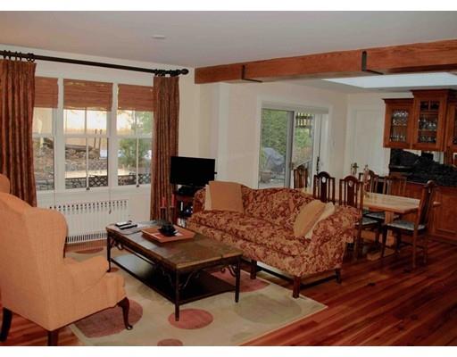 32 Chestnut Street Wellesley, MA 02481 - Photo 13 of 18 a living room with furniture and a large window