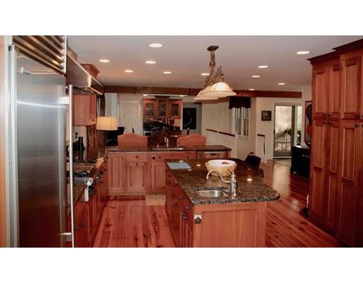 32 Chestnut Street Wellesley, MA 02481 - Photo 8 of 18 a kitchen with a refrigerator and a sink