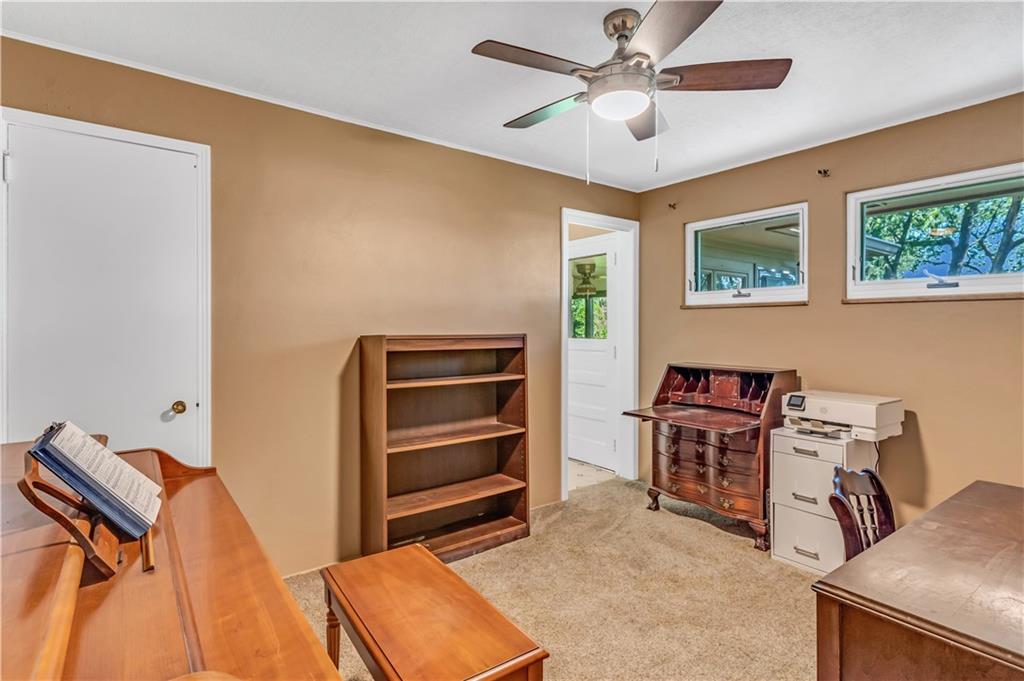 434 Summit Drive Pittsburgh, PA 15228 - Photo 14 of 24 a bedroom with a bed and a desk