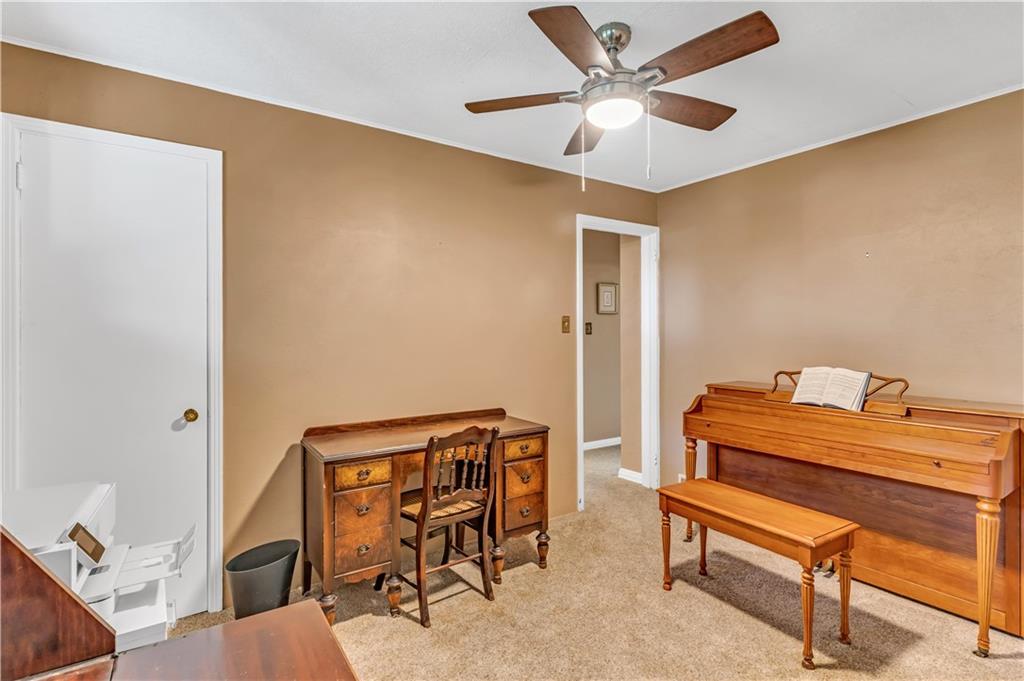 434 Summit Drive Pittsburgh, PA 15228 - Photo 15 of 24 a reading room with furniture and a piano