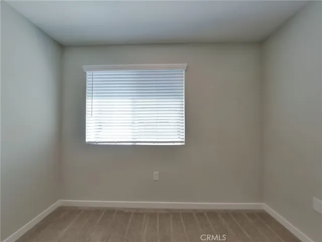 a bathroom with a toilet and a bathtub