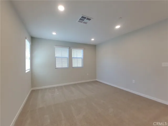 a view of front door and yard