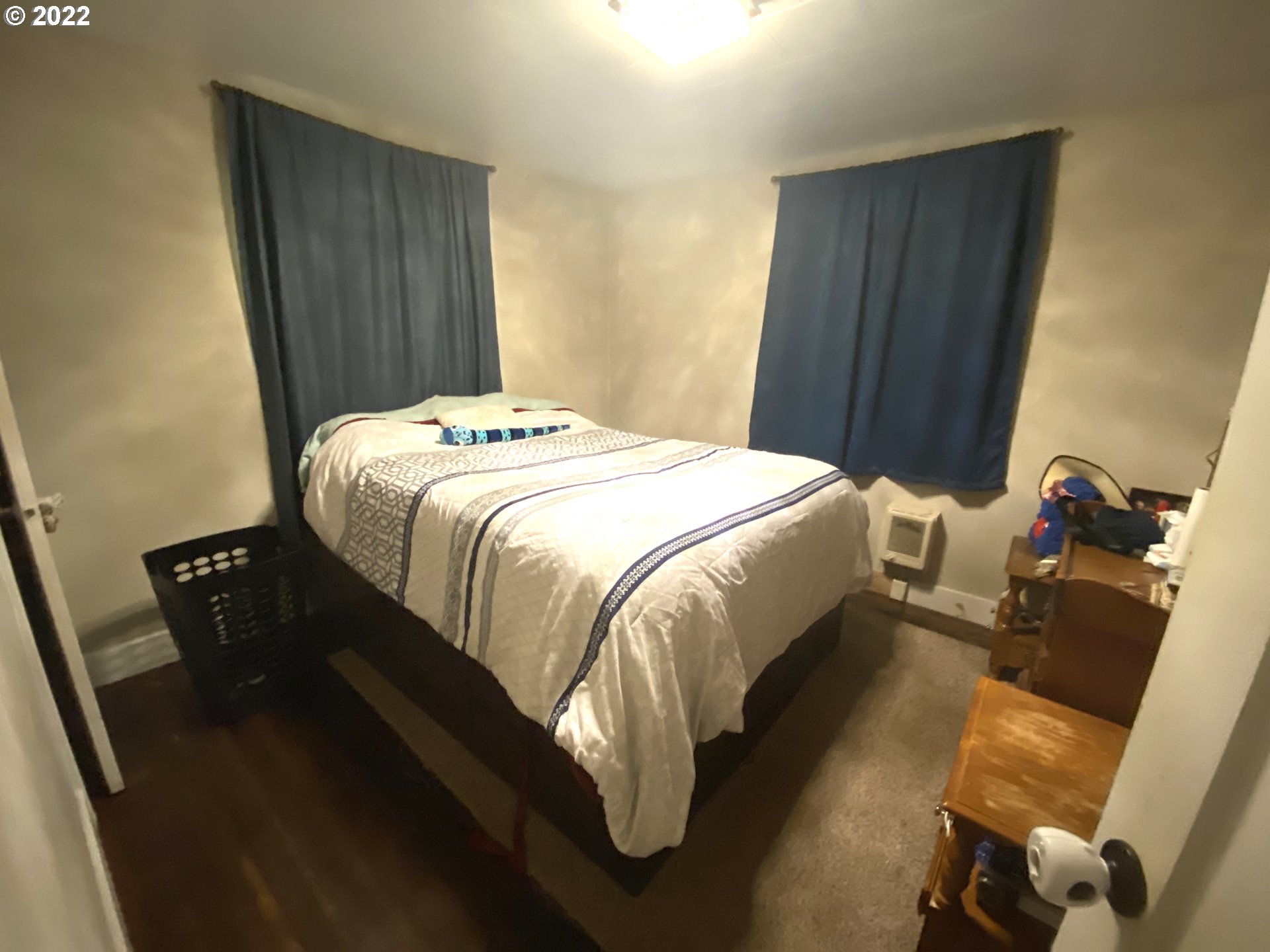 5560 A Street Springfield, OR 97478 - Photo 11 of 21 a bedroom with a bed and wooden floor